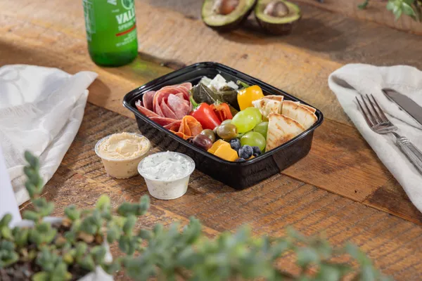 Mediterranean mezze platter with hummus and dips from Ikaria Kitchen