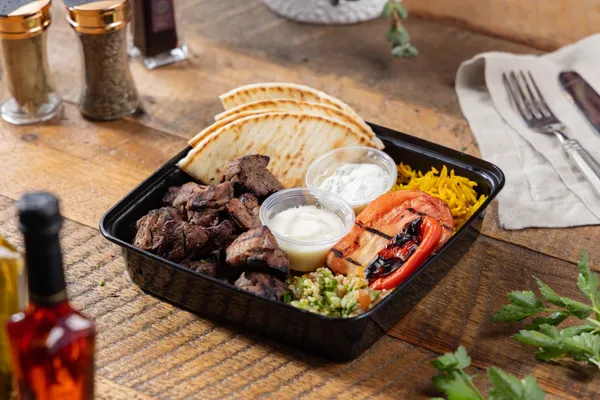 Grilled top sirloin steak kabob plate from Ikaria Kitchen